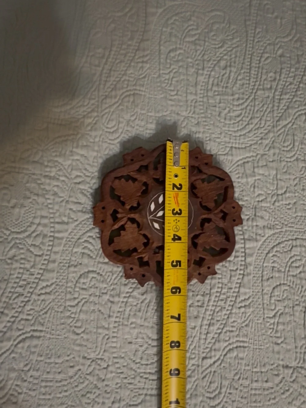 Hand Carved Wooden Trivet w/Inlaid Design 3 feet, gently used.